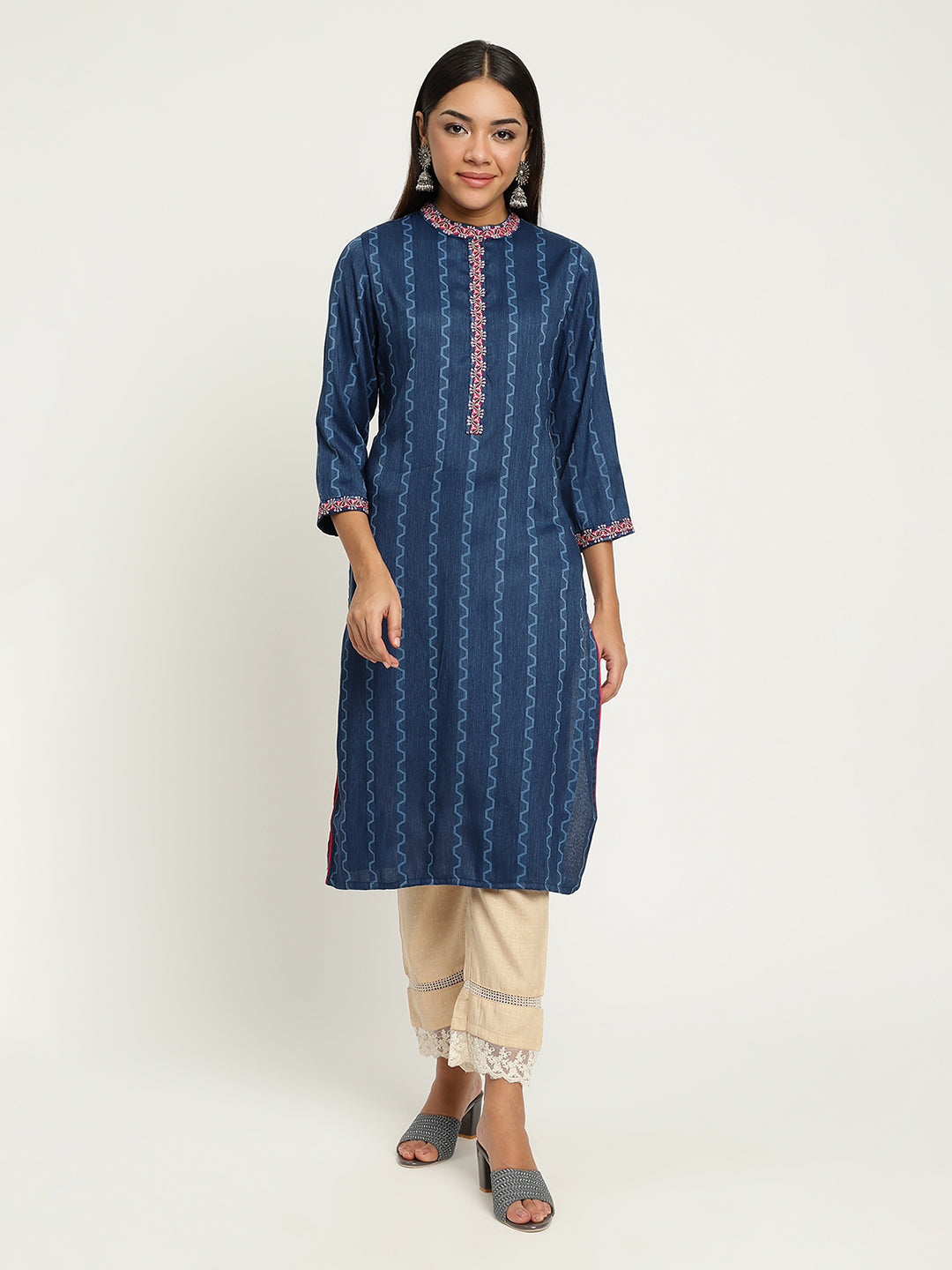 Women Blue Embroidered Kurta.
