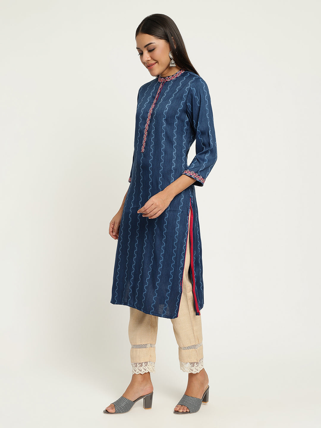 Women Blue Embroidered Kurta.