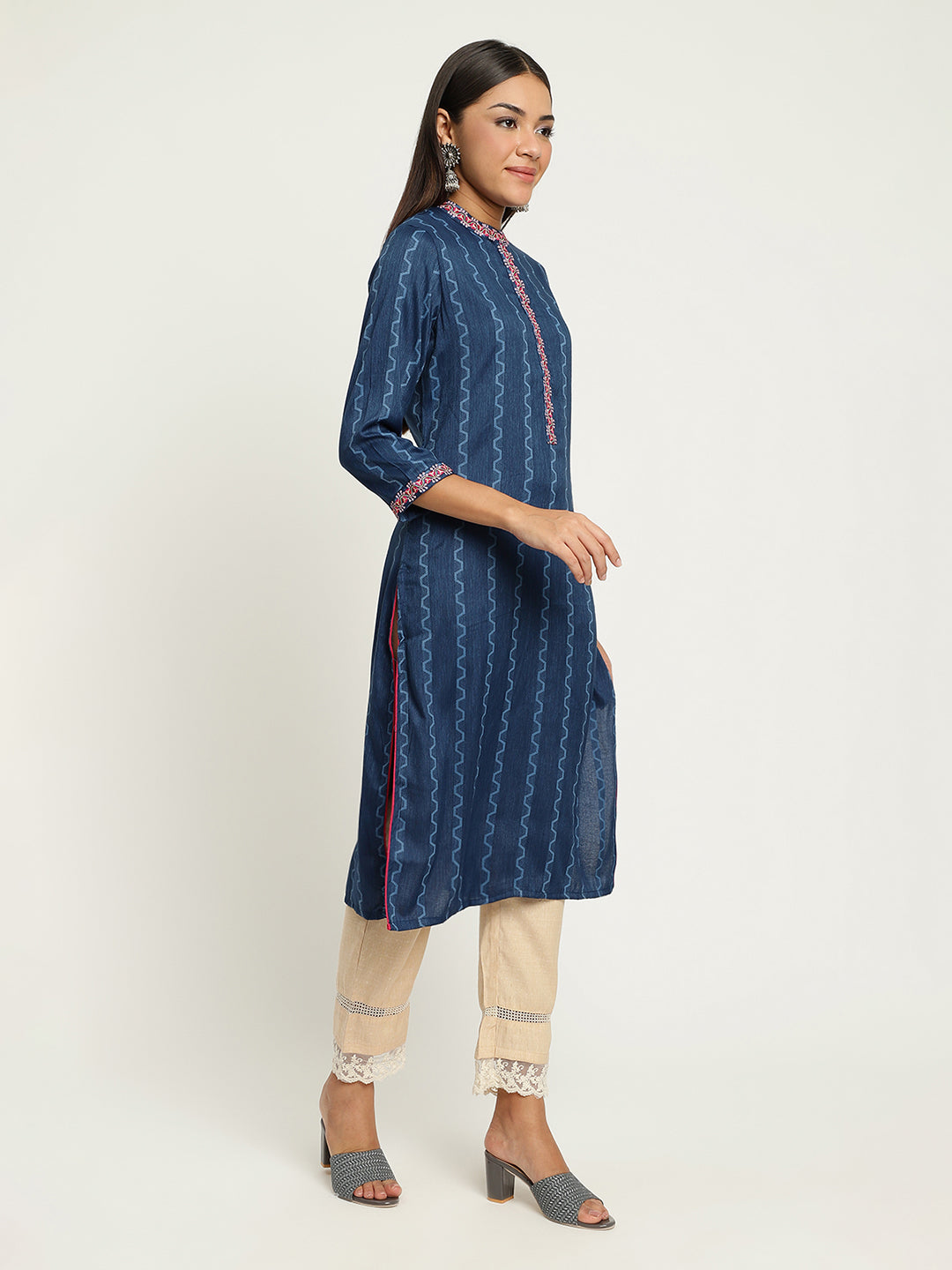Women Blue Embroidered Kurta.