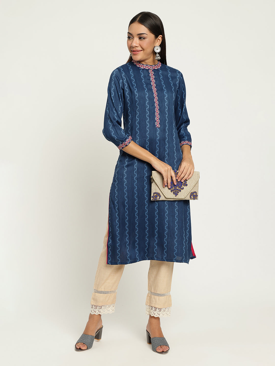 Women Blue Embroidered Kurta.