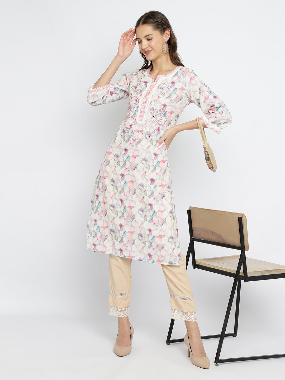 Women Off White geometrical printed embroidered kurta.