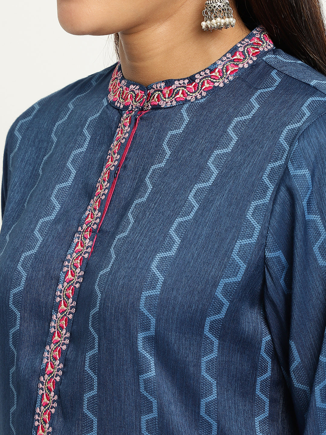 Women Blue Embroidered Kurta.