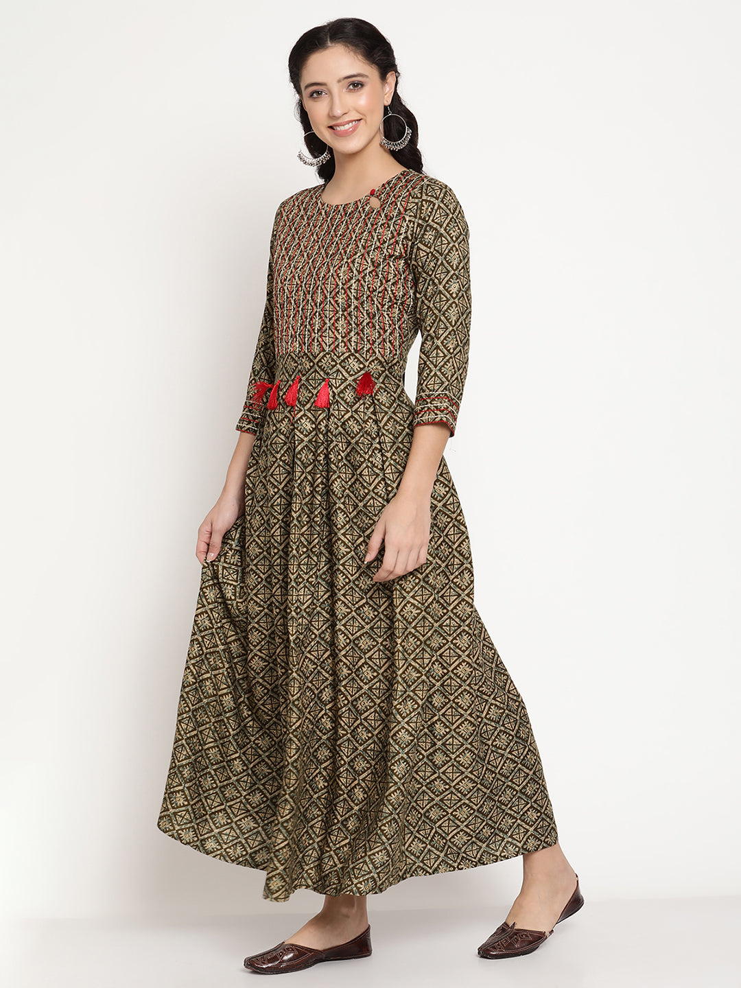 Be Indi Women Green Printed Running Stitch Embroidered With Red Tessel Box Pleat Maxi Dress
