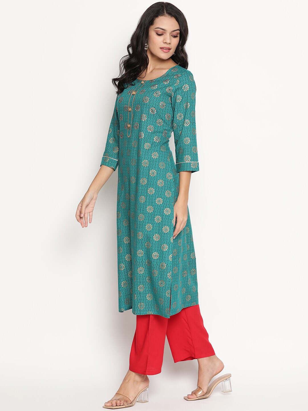 Women teal green golden printed straight kurta With pant